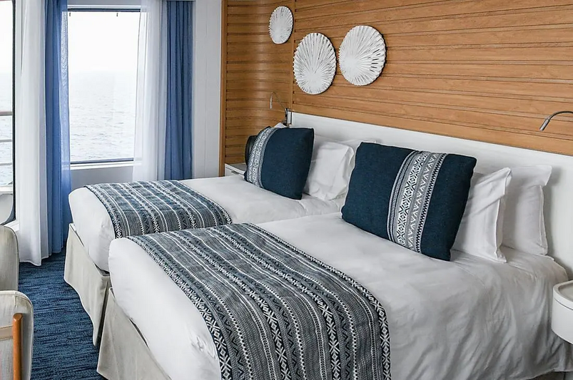 Schlafbereich Grand Suite auf einem Schiff der Explorerklasse von Ponant